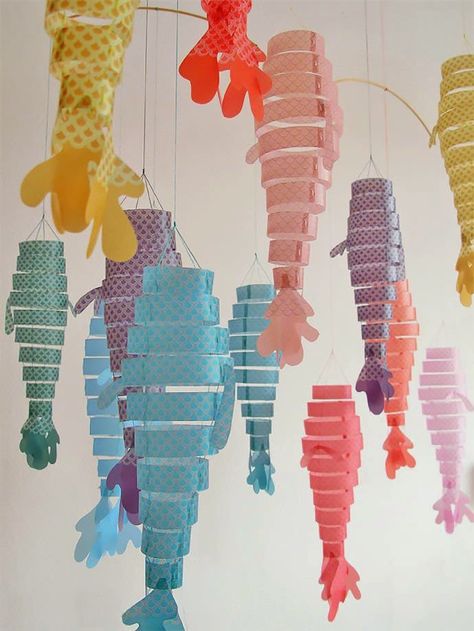 DIY Paper Fish Hanging Mobile Craft Fish Mobile, Mobile Craft, Paper Lanterns Diy, Paper Fish, Diy Lampe, Handmade Charlotte, Diy Lanterns, Hanging Mobile, The Ceiling