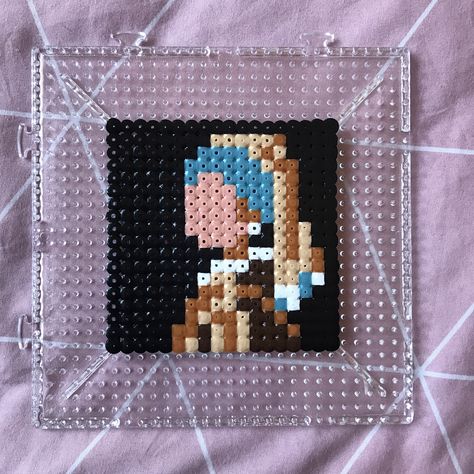 Vermeer’s masterpiece painting Girl With a Pearl Earring made from perler beads. 8 bit pixel art style Perler Beads Painting, Perler Beads Artwork, Tv Girl Perler Beads, Perler Bead Aesthetic, Painting Perler Beads, Perler Bead Painting, Perler Beads Art, 8 Bit Pixel Art, Art Perler Beads