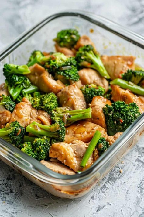 Photo showing a colorful Chicken and Broccoli Stir-Fry in a glass container. The chicken is golden-brown, and the broccoli is a bright green. Everything is coated with a glistening soy sauce and honey glaze. Pork Meatloaf, Chicken Broccoli Stir Fry, Lemon Butter Chicken, Lean Chicken, Grilled Chicken Thighs, Broccoli Stir Fry, Chicken And Broccoli, Dinner Meal, Easy Healthy Meal Prep