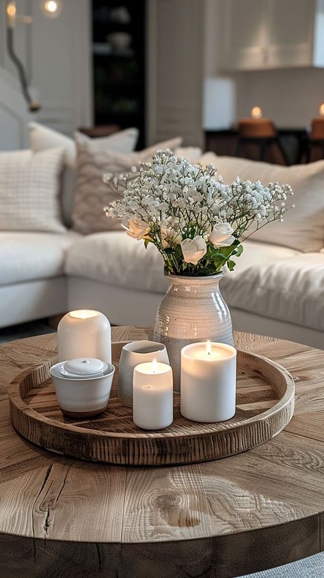 Discover 26 coffee table decor ideas you need to try in 2024. Refresh your space with these trendy and elegant tips. Click the link to see more and save the pin for later! Centerpiece For Round Coffee Table, Coffee Table Top Decor, Table Top Ideas Decor, How To Decorate A Round Coffee Table, Farmhouse Coffee Table Decor Ideas, Coffe Table Arrangment, Minimalist Coffee Table Decor, Coffee Table Candle Decor, Decorating A Coffee Table