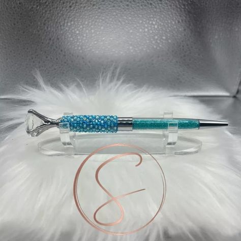 👉 Comment "Shop" order this item 👈 Aqua Aurora Borealis Diamond Top Blinged Out Pen 👇 Blinged out Diamond Top ball point pen with Aqua Aurora Borealis rhinesones and Aqua crystals in barrel of the pen. All stones used are high quality glass hand placed using Liquid Fusion glue (slight imperfections may occur). Pen comes with 1 extra ink refill. https://postdolphin.com/t/M05AX Aqua Crystals, Diamond Top, The Pen, Pointed Pen, Ink Refill, Aurora Borealis, Aurora, Glue, Barrel