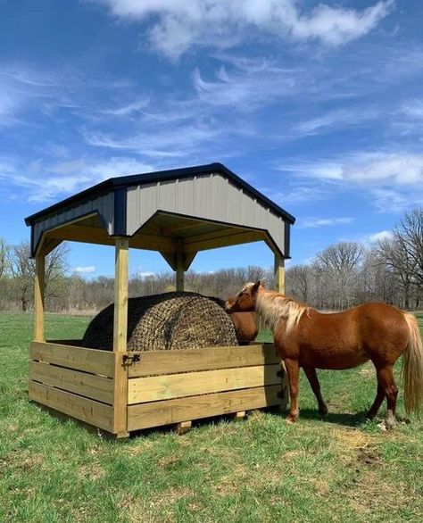 Tired of your expensive round bales sitting in the mud, snow & dirt? 
Want something to help keep the rain & snow off? Check out our 8’x8’ Round bale feeder!  

Features: 
29 Ga. exterior steel & trims 
.60 Treated skids, floor &  planking 
Completely assembled with screws & lag screws 
Available in 20 different colors Round Hay Bale Feeder, Covered Round Bale Feeder Diy, Horse Hay Feeder Diy, Round Bale Hay Feeder, Hay Hut, Diy Hay Feeder, Stable Hacks, Round Bale Feeder, Horse Shelters