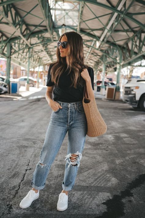 ashley wearing a black puff sleeve tee, distress denim, white sneakers, and a straw tote bag standing in an outdoor market 2023 Outfits Spring, Women’s Casual Spring Outfits, Mom Park Outfit Casual, Spring Casual Outfits Women 2023, Casual Outfit 2023 Winter, Spring Outfits 2023 Dress, Women’s Casual Outfits 2023, Spring Outerwear 2023, Spring Style 2023 Women Casual