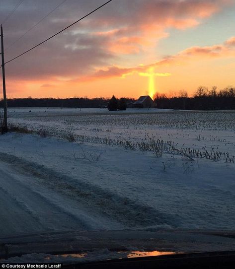 photo crossroads in the clouds by michael e loraff | Mechaele Loraff, 46, captured this image of a cross appearing in the ... Michigan, The Sun, Sun, Road