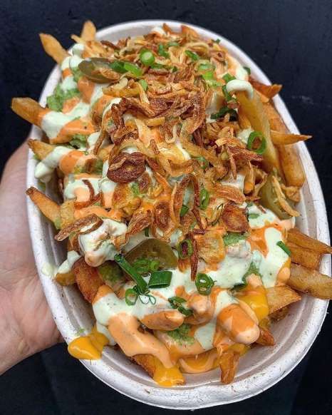 Ludlow Fries | New York - 375 Fries/facebook.com Pork Belly Loaded Fries, New York Fries Recipe, Swamp Fries, Pastrami Fries, Loaded Curly Fries, Fries Bar, Fish And Chips Menu, Chicken Chowmein Recipe, New York Fries