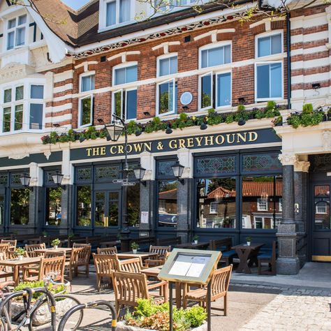 The Crown and Greyhound is a Grade II listed public house at 73 Dulwich Village, Dulwich, London. It is affectionately referred to by locals as 'The Dog', and sometimes as 'The Dog and Hat'. The Crown and Greyhound gets its name from two former pubs in Dulwich Village, The Crown, and The Greyhound, which were across the street from each other up to the 1890s. The present building was built in the Old English style in about 1897 on the site of The Crown. Dulwich Village, Old English Style, London Pubs, European Architecture, Public House, Front Elevation, English Style, Old English, Pet Store