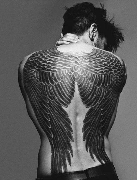 20 Cool Angel Wing Tattoos for Men in 2021 - The Trend Spotter Angel Wing Arm Tattoo, Angel Wings Back Tattoo, Angel Wings Halo Tattoo, Wings Back Tattoo, Angel Wing Tattoos, Angel Wings Tattoo On Back, Back Tattoo Women Spine, Wing Tattoos On Back, Wing Tattoo Men