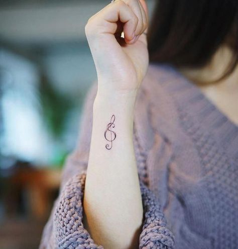 150+ Meaningful Treble Clef Tattoo Designs for Music Lovers (2021) Small Music Tattoos, Treble Clef Tattoo, Meaningful Wrist Tattoos, Simple Tattoos For Women, Tato Henna, Circle Tattoos, Small Tattoos With Meaning, Note Tattoo, Music Tattoo Designs