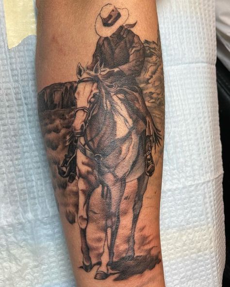 Tats Ideas Men, Black And Grey Cowboy Tattoo, Cowboy Scene Tattoo, Rodeo Tattoos Cowboys, Western Upper Arm Tattoos, Black Cowboy Tattoo, Cowboy Theme Tattoo Sleeve, Western Sleeve Tattoos For Guys, John Wayne Inspired Tattoos