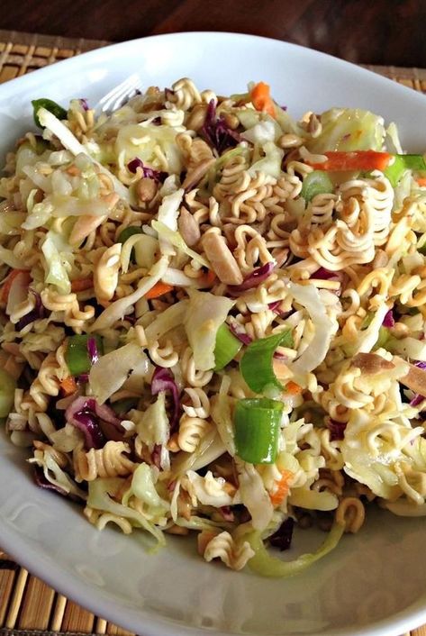 Ramen noodles are combined with cabbage, almonds, and sunflower seeds in this recipe for ramen salad. Ramen Cabbage Salad, Crunchy Noodle Salad, Best Ramen Noodles, Ramen Salad, Ramen Noodle Salad, Ramen Dishes, Top Ramen, Noodle Salad Recipes, Ramen Noodle Recipes