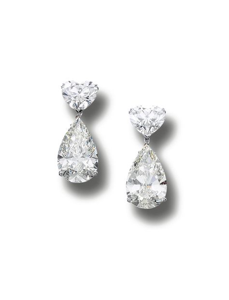 Impressive pair of diamond earrings.  Each composed of a heart-shaped diamond weighing 5.01 and 5.04 carats respectively, suspending a removable pear-shaped diamond drop weighing 12.02 and 12.92 carats respectively, mounted in white gold. Heart Shape Diamond Earrings, Bee Earring, Pear Diamond Earrings, Heart Shaped Diamond Earrings, Heart Diamond Earrings, Diamond Heart Earrings, Accessories Stand, White Gold Drop Earrings, Pear Earrings