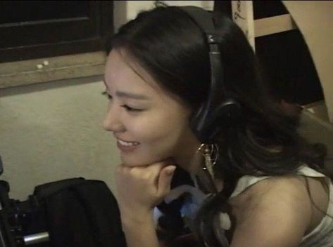 Kim Ah Joong, A Woman, Headphones