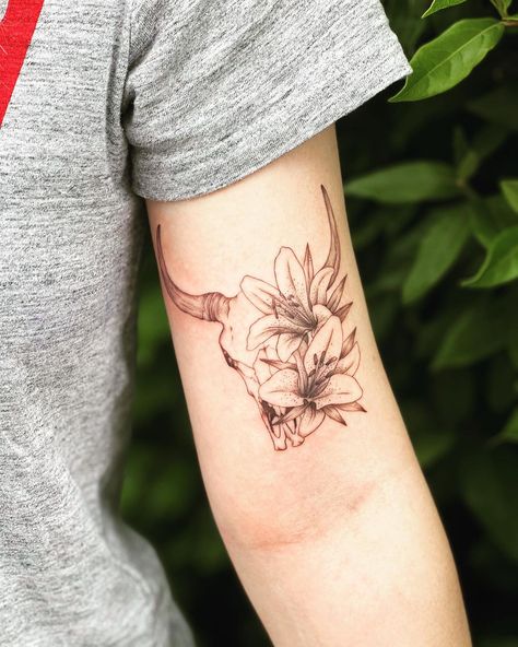 Small Taurus Tattoo For Guys, Taurus Tattoo For My Son, Taurus Skull Tattoo For Women, Small Bull Tattoo Women, Taurus Lily Tattoo, Feminine Taurus Tattoo Ideas, Bull Horn Tattoo Women, Taurus Floral Tattoo, Taurus Tattoo For Women Zodiac