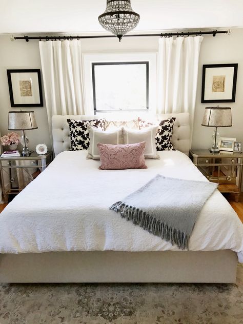 Neutral Master Bedroom. Pop of pink. Window behind bed. Throw pillows. Master bedroom decor. Bedroom styling Behind Bed Decor, Window Behind Bed, Curtains Behind Bed, Bedroom Trends, Woman Bedroom, Bedroom Closet, Spare Bedroom, Master Bedrooms Decor, Remodel Bedroom