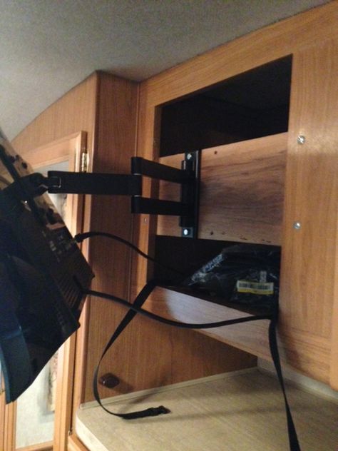 Rv Tv Ideas, Tv In Camper Ideas, Tv In Rv Ideas, Camper Tv Mount Ideas, Rv Tv Cabinet Remodel, Rv Tv Mounting Ideas, Rv Tv Mount, Organize Laundry, Camper Organization Rv Living