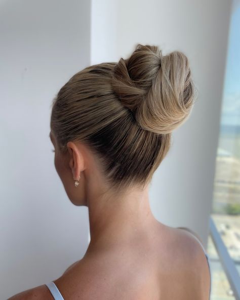 High neck dress, or have a dress that has lots of fun details? Consider a clean bun🤍⁣ ⁣ Absolutely loved this look on Maddy, she wanted her bun to be high so she could transform it into a party ponytail for the reception! It was the perfect look to compliment her dress!⁣ ⁣ Swipe to see the look from the front and a sneak peak of Maddy from her special day🥹 Clean Bun, Sleek High Bun, Party Ponytail, Bridal Bun, Easy Bun, High Bun, Hair Vendor, Short Wedding Hair, Dress Hairstyles