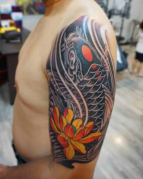 Koi Fish Tattoo Designs For Men 3 Black Koi Fish Tattoo, Koi Fish Tattoo Meaning, Koi Fish Tattoos, Black Koi Fish, Japanese Koi Fish Tattoo, Koi Tattoo Sleeve, Koi Tattoo Design, Around Arm Tattoo, Saved Tattoo