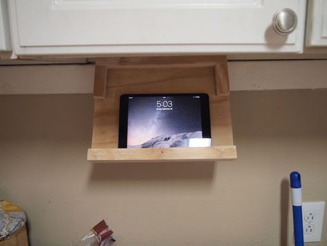 DIY iPad holder under kitchen cabinet keeps online recipes closeby Under Cabinet Tablet Holder, Diy Recipe Holder, Recipe Book Holder In Kitchen, Cookbook Holder Diy, Kitchen Ipad Holder, Ipad Holder Diy, Kitchen Tablet Holder, Kitchen Ipad, Tablet Organizer