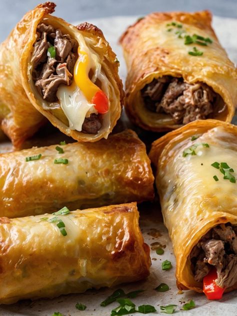 Philly Cheesesteak Egg Rolls Recipe - cooking art Cheesesteak Roll Ups, Shredded Beef Egg Rolls, Different Egg Roll Recipes, Philly Roll Sushi, Philly Cheese Steak Egg Rolls, Cheesesteak Eggrolls, Cheesecake Egg Rolls, Philly Cheesesteak Egg Rolls, Cheesy Baked Chicken