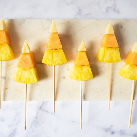 Enjoy a tasty and delicious meal with your loved ones. Learn how to make Candy Corn Fruit-and-Cheese Skewers & see the Smartpoints value of this great recipe. Ghost Fruit Skewers, Halloween Fruit Skewers, Halloween Skewers, Skewers Recipes, Cheese Skewers, Halloween Eats, How To Make Candy, Fruit Sticks, Halloween Fruit