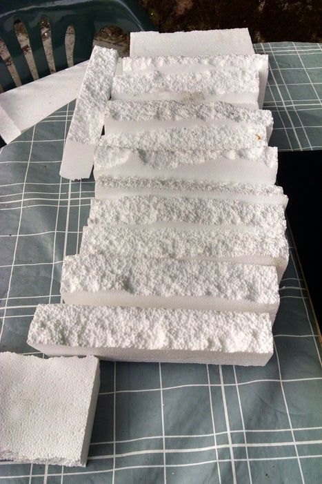 form. Diy Faux Rocks, Diy Stone Wall, Styrofoam Packaging, Styrofoam Art, Styrofoam Crafts, Fake Rock, Faux Rock, Company Christmas Party, Foam Art