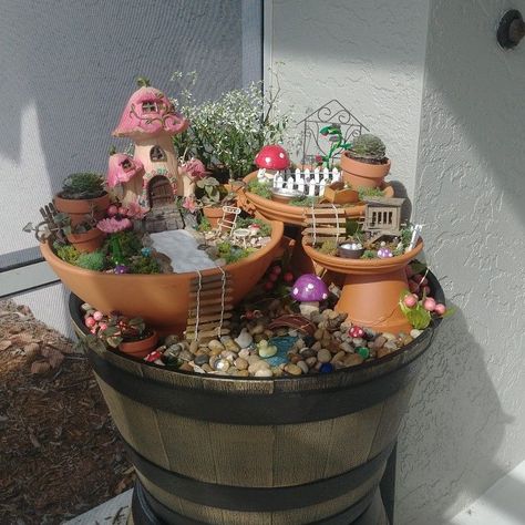 Front Porch Fairy Garden, Multi Level Fairy Garden, Fairy Gardens In A Pot, Potted Fairy Garden Ideas, Tiered Fairy Garden, Large Fairy Garden Ideas Outdoor, Fair Garden Ideas Diy, Container Fairy Garden Ideas, Small Fairy Garden Ideas