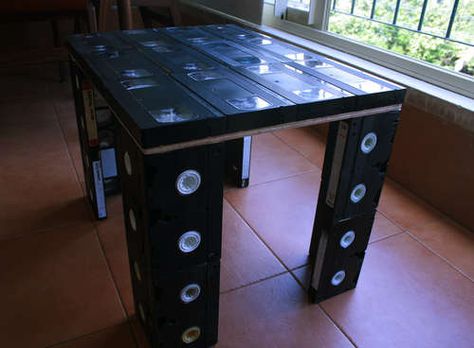 I have my base built but need some more tapes to finish what will be an end table:)  Similar to this but not quite as big... Vhs Crafts, Vhs Storage, Vcr Tapes, Vhs Player, Stereo Cabinet, Vhs Cassette, Entertainment Cabinet, Make A Table, Strongest Glue