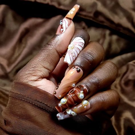 Something a lil sassy #pinterestnails #pressonnailset #pressons #nailart #covetedclaws #obsessed Brown Pearl Nails, Pearl Nails, Abstract Designs, Brown Shades, Price Quote, Gold Accents, Press On Nails, Abstract Design, Statement Pieces