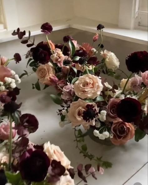 Embracing the richness of autumn with a touch of dark elegance.⁠ ⁠ Would you consider a dark and moody floral palette for your wedding? Let us know in the comments! ⁠ ⁠ #Fallwedding #Halloweenwedding #moodyflorals #darkwedding #moodywedding #gothicwedding #spookyseason #uniqueweddingideas #edgywedding #fallinspiration⁠ Dark And Moody Wedding Florals, Dark And Moody Flowers, Moody Rustic Wedding, Fall Moody Wedding, Moody Garden Wedding, Moody Bridal Bouquet, Moody Spring Wedding, Moody Neutrals, Moody Wedding Flowers