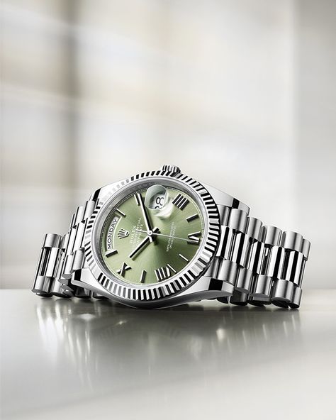 Leading the field. The Oyster Perpetual Day-Date 40 in 18ct white gold. Its exclusive olive green dial is enhanced by the 18ct gold faceted Roman numerals. The day of the week is spelt out in a window at 12 o’clock and the date displayed at 3 o’clock. It is equipped with perpetual calibre 3255. #Rolex #DayDate #101031 Used Rolex, Mens Digital Watches, Swiss Luxury Watches, Rolex Watches For Men, Chronograph Watch Men, Rolex Watch, Rolex Oyster Perpetual, Rolex Oyster, Rolex Day Date