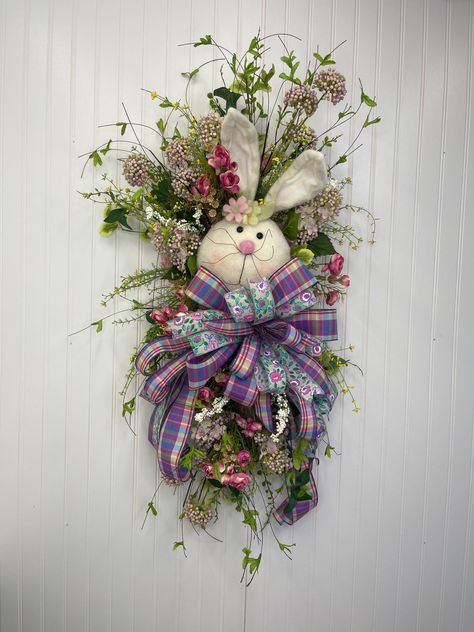 This DIY Easter Wild Flower Bunny Swag is a perfect addition to your spring front porch decor. Learn how to DIY this today! Bunny Wreaths For Front Door, Diy Swag, Spring Front Porch Decor, Easter Swags, Wreath Swag, Easter Door Wreaths, Rabbit Wreath, Easter Spring Wreath, Spring Decorations