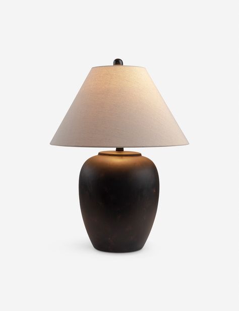 Simply stunning—the Kimora table lamp brings a timeless look to any tabletop. Its sleek vessel shape is topped with a beige linen shade that filters a warm pool of light. This lamp's black finish and matching finial offer a versatile fit with standout appeal for transitional decor. Burled Wood Furniture, Mantel Mirrors, Table Lamp Black, Black Lamp, Cordless Table Lamps, Bathroom Ceiling Light, Outdoor Furniture Collections, Ceramic Table Lamp, Lamp Black