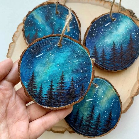 Black Pine Tree, Sky And Stars, Wood Slice Ornaments, Wooden Artwork, Wood Slice Art, Watercolor Galaxy, Wood Slice Ornament, Wood Christmas Ornaments, Wooden Christmas Ornaments