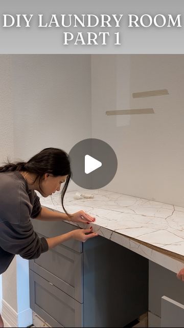 Leyla | DIY & Home Decor on Instagram: "DIY LAUNDRY ROOM: Progress Pt. 1. I’m already in love with how this space is turning out.

The star of this design is the stunning fractured marble countertop. Would you have guessed it’s laminate?! @formicagroup 

See you guys in stories to wrap up this space with backsplash and MORE 🤩
.
.
.
#laundryroommakeover #formica #formicalivingimpressions #diylaundryroom #2024LivingImpressions" Laundry Room Laminate Counter, Diy Ikea Laundry Room, Washer Dryer In Garage Ideas, Formica Countertops Laundry Room, Ikea Laundry Pedestal, Washer Pedestal Diy, Trofast Laundry, Laundry Room Countertop Options, Ikea Washer Dryer Pedestal