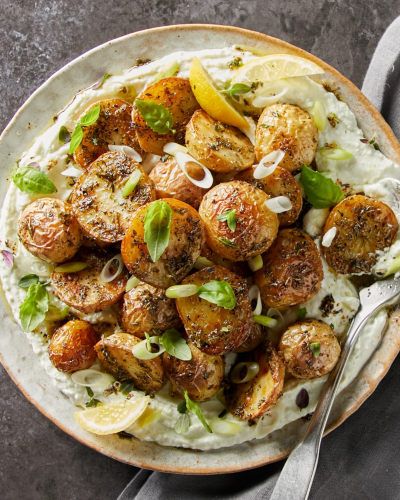 Spring Onion Whipped Feta with Roasted Herb Potatoes - ALDI UK Herb Potatoes, Curry Recipes Vegetarian, Mini Potatoes, Vegetarian Curry, Whipped Feta, Spring Onion, Roasted Potatoes, Curry Recipes, How To Dry Oregano