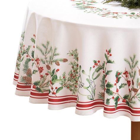 PRICES MAY VARY. 100% Polyester ELEGANT CHRISTMAS TABLECLOTH: Whether you use this traditional Christmas tablecloth for a party or family dinner, it’s sure to bring a touch of holiday charm to any dining tablescape. Coordinate it with the Winter Holiday Berry napkins, placemats, and table runner to complete the look. HIGH-QUALITY HOME DECOR: Made from durable 100% polyester, this white tablecloth is decorated with green branches, pine cones, and winter berries on a soft white ground. It also fea Christmas Table Covers, Holiday Berries, Oval Tablecloth, Elegant Tablecloth, Christmas Table Linen, Tablecloth Fabric, Christmas Table Cloth, Williams Sonoma, Holiday Tables