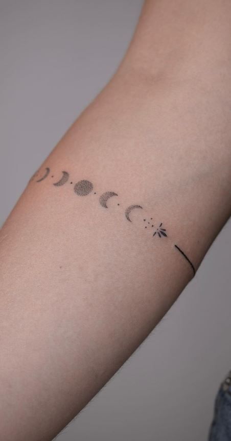 Ink Chronicles: A Journey Through Tattoo Culture Cute Moon Phases Tattoo, Hand Moon Tattoos For Women, Small Phases Of The Moon Tattoo, Dainty Moon Phases Tattoo, Moon Phases Tattoo Finger, Moon Phases Fine Line Tattoo, Moon Phase Wrist Tattoo, Moon Thumb Tattoo, Lunar Phases Tattoo Spine