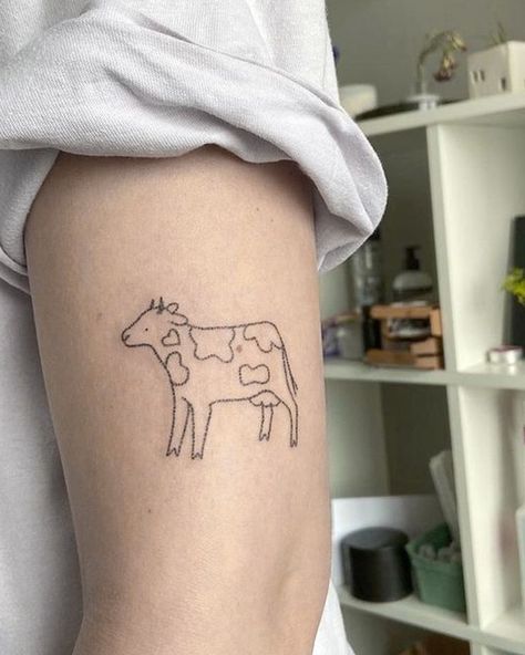 Step into the farmyard of fashion with cow tattoo designs! We've rounded up over 70 cow tattoo ideas that are just udderly irresistible. Cow Tattoo Ideas, Cow Tattoos, Matching Friend Tattoos, Cow Tattoo, Bestie Tattoo, Vegan Tattoo, Mini Cows, Friend Tattoos, Little Tattoos