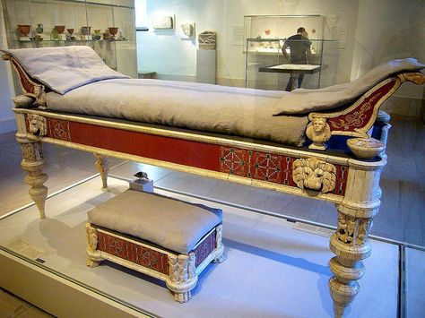 Roman couch . These pieces of furniture come from the imperial villa of Lucius Verus (co-emperor, A.D. 161-169) on the Via Cassia outside Rome. On the couch legs are friezes of huntsmen, horses and hounds flanking Ganymede. On the sides of the bed frame, the lion protomes (animal head adornments) have eyes inlaid with glass. On the footstool are scenes of winged cupids and leopards. Metropolitan Museum of Art  NYC Ancient Roman Houses, Roman House, Roman Artifacts, Roman Villa, Roman Era, Empire Romain, Rome Antique, Classical Antiquity, Roman Architecture