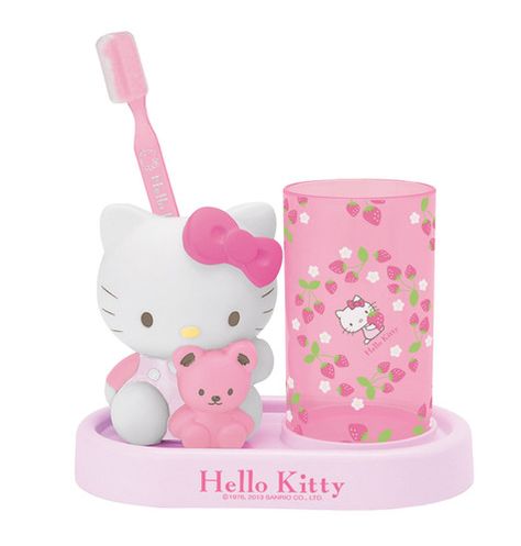 Hello Kitty Strawberry Toothbrush Center    Get excited about toothbrush time whenever you use the Hello Kitty Toothbrush Set. The strawberry-themed set features a removable figurine/toothbrush holder and transparent cup. And let's not forget the most important thing... your set will come complete with a pink Hello Kitty toothbrush!     - 6.5"H x 7"W x 3.8"D   - AS  - BPA Free  - Heat resistant to 176F, cold resistant to -4F  - This product is not microwave or dishwasher safe Hello Kitty Toothbrush, Hello Kitty Bathroom, Penyimpanan Makeup, Hello Kitty Strawberry, Kitty House, Hello Kitty Room, Hello Kitty Room Decor, Kitty Room, Hello Kitty Things