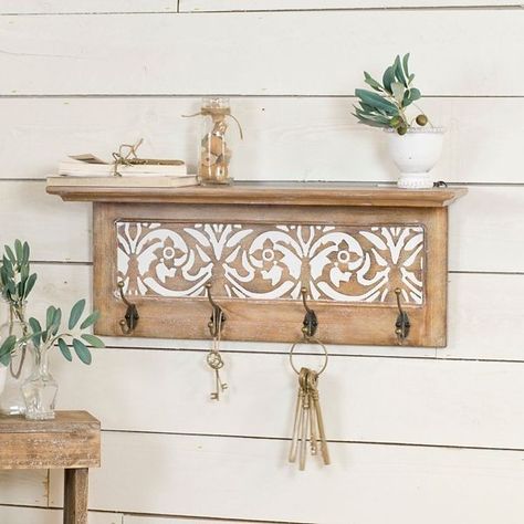 Wall shelf with hooks