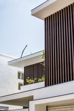 Private Residence With Indoor Pool And Brick Feature Wall At Its Heart | Shanmugam Associates - The Architects Diary Louvers Design Exterior Wall, Feature Wall Design Exterior, Wpc Louvers Exterior Elevation, Exterior Louvers Design, Exterior Feature Wall, Boundary Wall Ideas, House Plant Tattoo, Boundary Wall Designs, Modern Facade Design