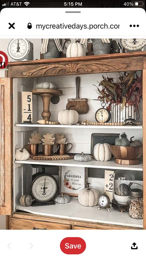 Above Armoire Decor, Moody Bookshelf, Fall Hutch Decor Ideas, Bookcases Styling, Fall Hutch Decor, Kitchen Hutch Decor, Armoire Decor, Vintage Booth, Vintage Fall Decor