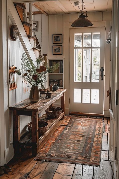 Explore warm home aesthetic entryway ideas that create a cozy and inviting atmosphere. Embrace vintage and rustic elements for a charming space. 🌸🏡 Vintage Entrance Hall, Cozy Home Entrance, Cozy Homestead Aesthetic, Minimal Cozy Aesthetic, Cottage Cozy Home Aesthetic, Warm Cottagecore Aesthetic, Antique House Aesthetic, Rustic Home Aesthetic, Granny Core Aesthetic Home