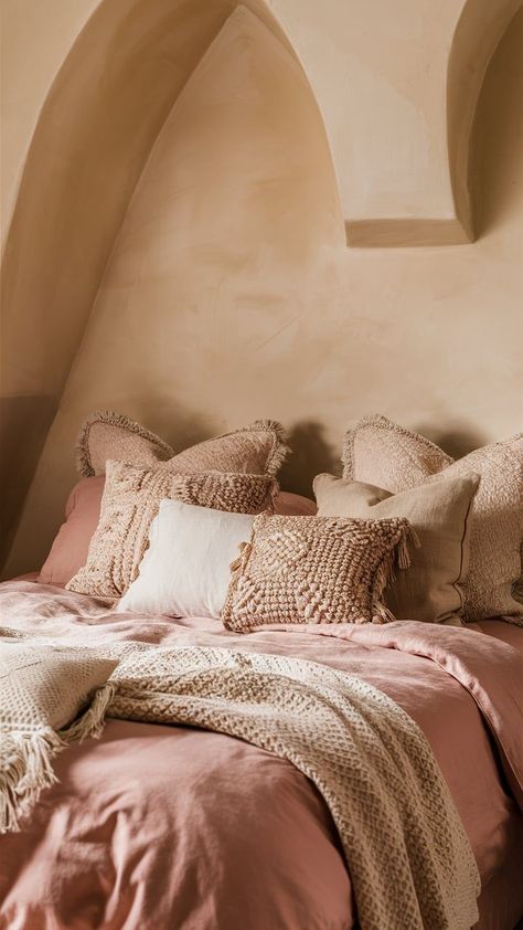 A cozy bedroom with soft pink and beige bedding, layered pillows, and light wooden furniture, creating a calm and inviting atmosphere Pink And Beige Bedroom, Pink Upholstered Bed, Bedding Plush, Dusty Pink Bedroom, Pink Bedroom Ideas, Unique Themes, Beige Bedroom, Pink Bedrooms, Blush Tones