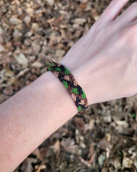 Is that... a bracelet I made recently that DOESN'T have a cowrie shell in the middle?? Yes. Yes, it is. I've been seeing this bracelet pattern circling my feed for a little bit, so I decided to make it. #friendshipbracelets #camo #camouflage #bracelets #braceletmakersofinstagram #handmadebracelets #handmade Camo Bracelet Pattern, Camo Bracelet, Cowrie Shell, A Bracelet, Bracelet Patterns, Handmade Bracelets, Friendship Bracelets, I Decided, Diy Jewelry