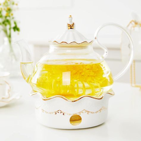 The elegant petal shape with hand-painted embossed flower & gold trim brings a lovely atmosphere while enjoying tea time or tea party with your friends and family, and an elegant way to enjoy your life.
The luxury teapot makes the perfect gift for occasions like Mother's Day, weddings, anniversaries, Christmas, Valentines, birthdays, or any other gift-giving opportunities. The relief design also makes a great home decor, you will surely enjoy having guests with this set on your table. Tea Warmer, Blooming Tea, Tea Party Setting, Tea Gift Sets, Glass Teapot, Pot Set, Tea Gifts, Flower Tea, Enjoy Your Life