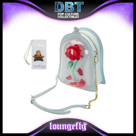 Bring the magic of your favorite fairytale to life with the Exclusive - Disney Stitch Shoppe Beauty and the Beast Enchanted Rose Crossbody Bag. This spellbound accessory takes the form of the Beast’s bell jar. On the front of the bag, a three-dimensional rose is enclosed in a domed, transparent capsule. Gold sparkles a Blueberry Cobbler, Enchanted Rose, The Bell Jar, Gold Sparkle, Stitch Disney, Enchanted, Beauty And The Beast, Three Dimensional, Crossbody Bag