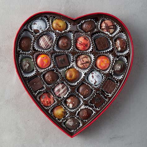 #ValentinesDay fact no.9 - The first #heartshapedbox of chocolates was introduced in 1861. Richard Cadbury of @CadburyUK started packaging chocolates in fancy boxes to increase sales. Now, more than 36 million heart-shaped boxes of chocolates are sold each year. 🍫 Heart Box Of Chocolates, Milk Chocolate Ganache, Hazelnut Milk, Fancy Boxes, Box Of Chocolates, White Chocolate Ganache, Fondue Set, Heart Shape Box, Heart Box