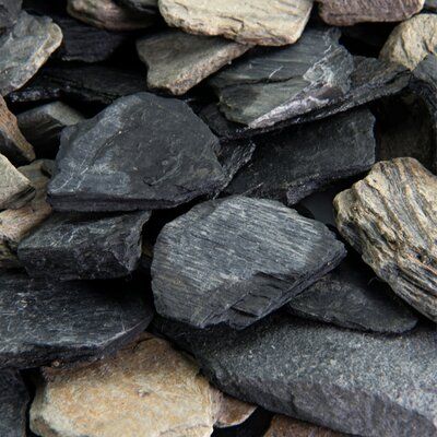 Fire Pit Essentials Natural Black and Tan Slate Chips Landscaping Rocks | Wayfair Slate Chips Landscaping, Backyard Hardscape Ideas, Black Rock Landscaping, Cedar Garden Bridge, Decorative Garden Stones, Fire Pit Essentials, Landscaping Rocks, Landscaping Rock, Slate Rock